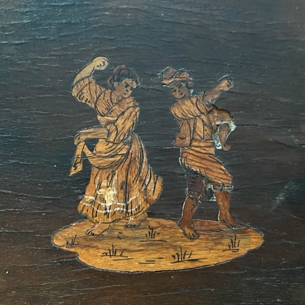 Wooden box. Dancing couple on lid.